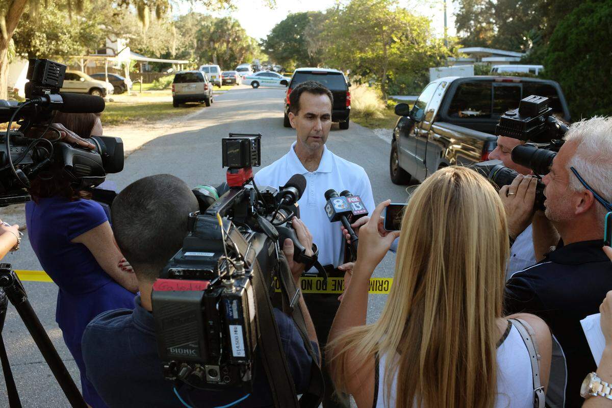 Manatee County Sheriff’s Office public information officer Dave Bristow talks with the media gathered near the home of Andres Avalos where he killed his wife, Amber Avalos, and neighbor, Denise Potter, before going to Bayshore Baptist Church on 14th Street West and killing the lead pastor James “Tripp” Battle.