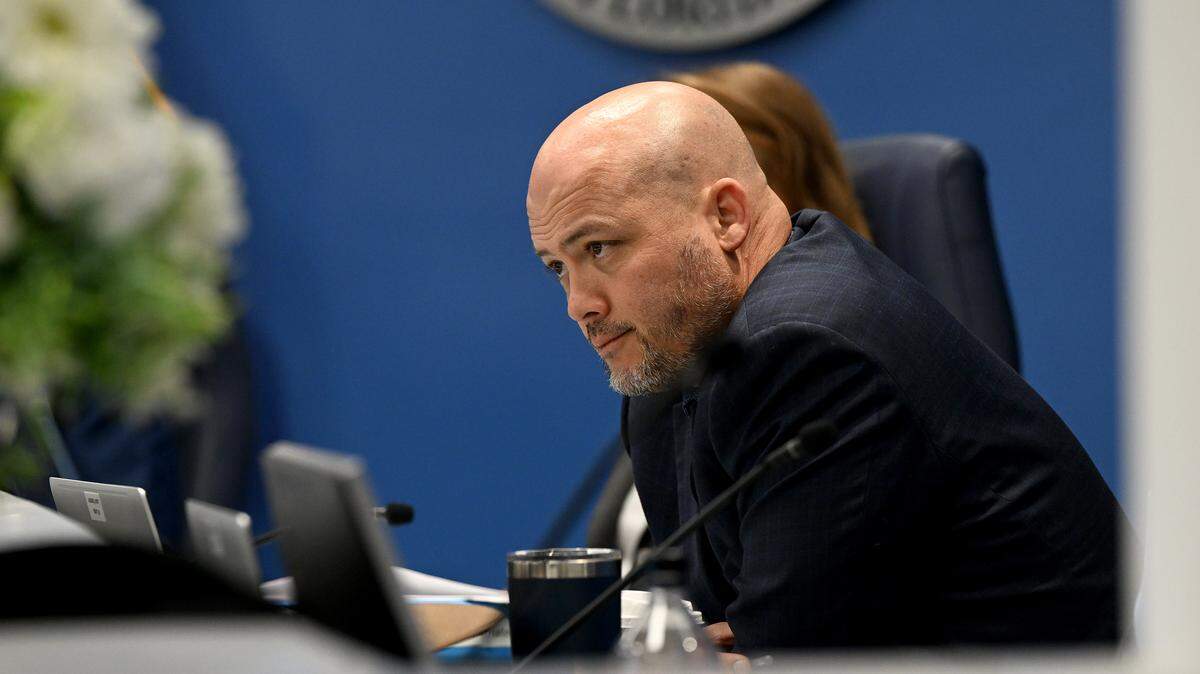 Commissioner Jason Bearden listens during a meeting of the Manatee County Board of Commissioners on Tuesday, April 7, 2026, to discuss a proposal requiring nonprofits receiving county funding to verify the legal status of clients.