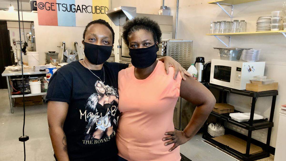 Paula Tromp of Happy Soul Delight, left, and Valencia Mitchell of Sugar Cubed Pastry Lab in downtown Bradenton are hopeful that Black Lives Matters protests will advance the cause of racial equality.