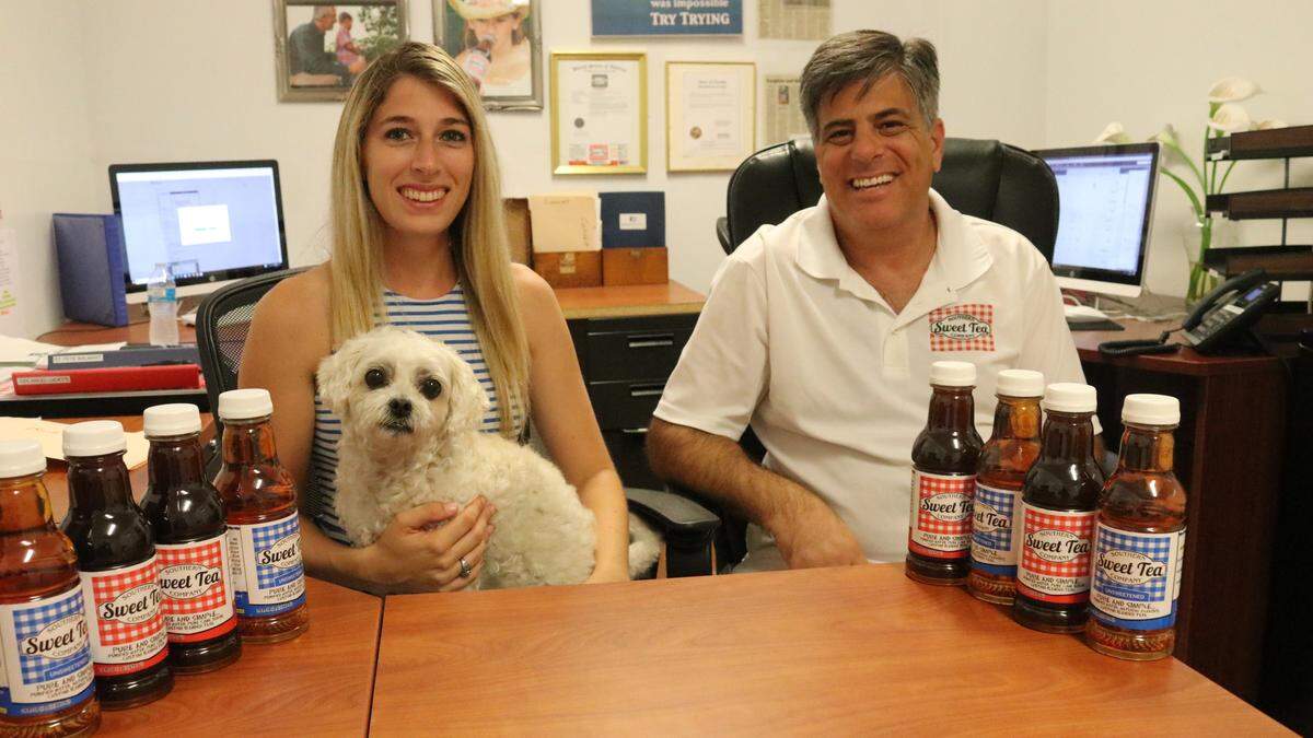 Laura Jean (shown with her 11-year-old Peekapoo, Lili) and her father, Joseph Mammina, have added unsweetened tea to their offerings and are selling their teas in more supermarkets.