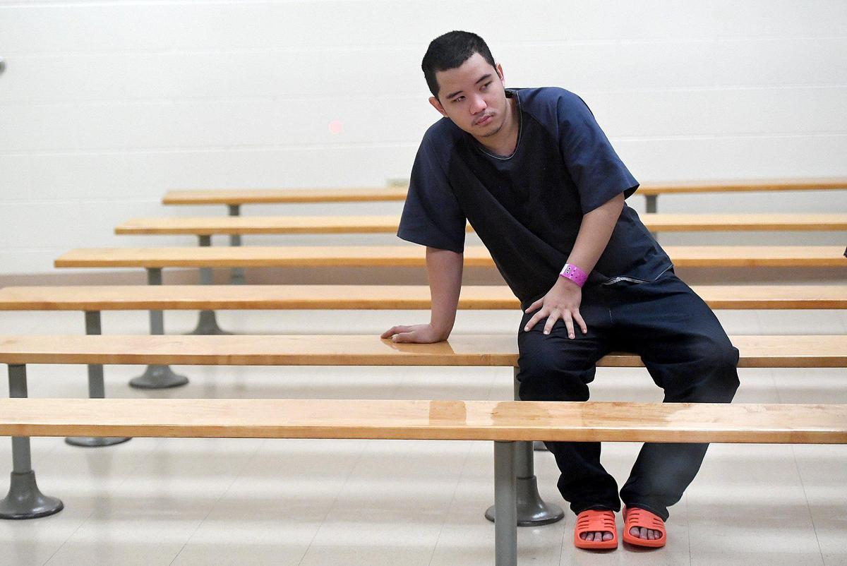 Ande Ebalan sits for a short time in the area designated for first court appearances at the Manatee County Jail where he bonded out before appearing before Judge Diana Moreland. Ebalan said he shot Ryan Booth in self-defense during a drug deal.