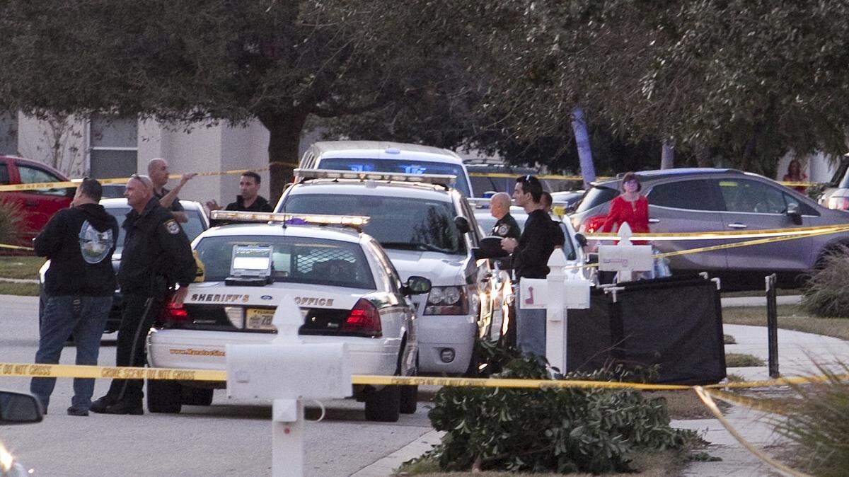 Manatee County Sheriff's personnel work inside the investigation scene Sunday evening in the Sabal Harbour subdivision south of Bradenton where a man armed with a knife was shot and killed by a deputy when he reportedly moved to attack law enforcement. MATT M. JOHNSON/Bradenton Herald