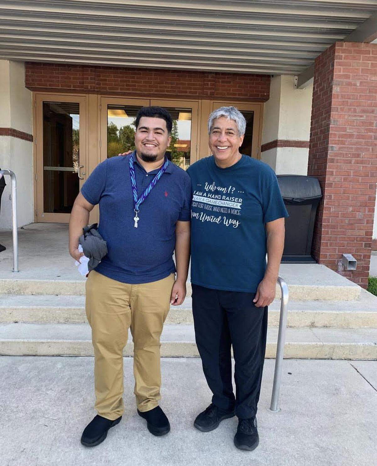 Eric Silva Gomez and Hector Tejeda stand outside of Cedar Hall at Flagler College in 2019.