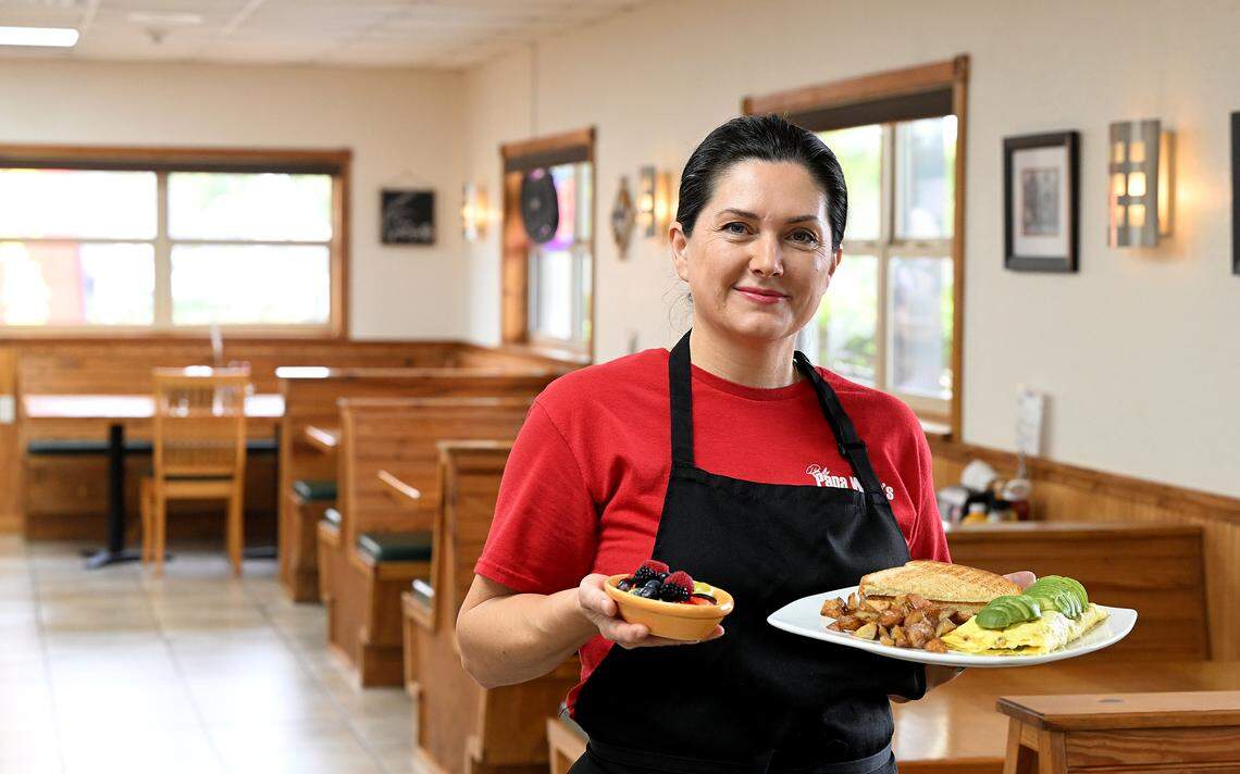 Co-owner Natalia Dubbaneh with an avocado omelette at Papa Wally’s Cafe in Bradenton on Feb. 13, 2026.
