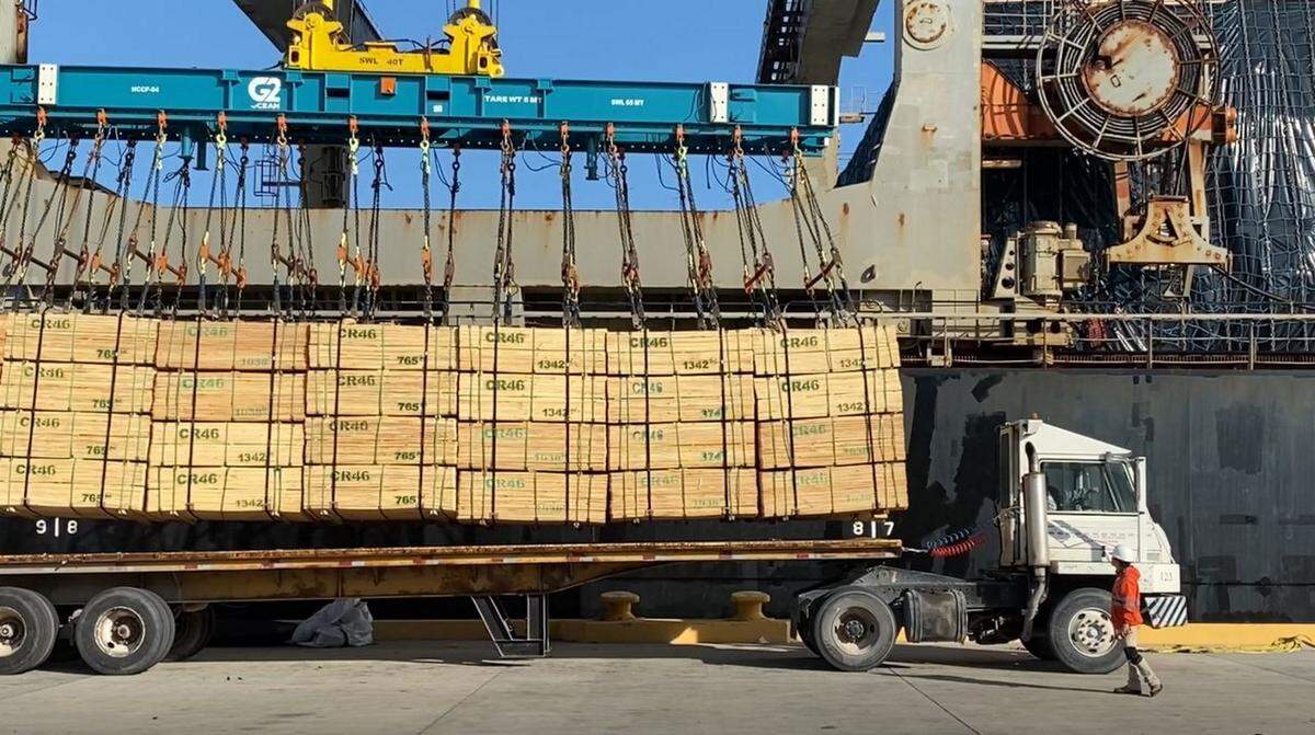 Lumber is offloaded from a G2 Ocean vessel at Port Manatee, helping fulfill growing demand from consumers tackling home improvement projects.