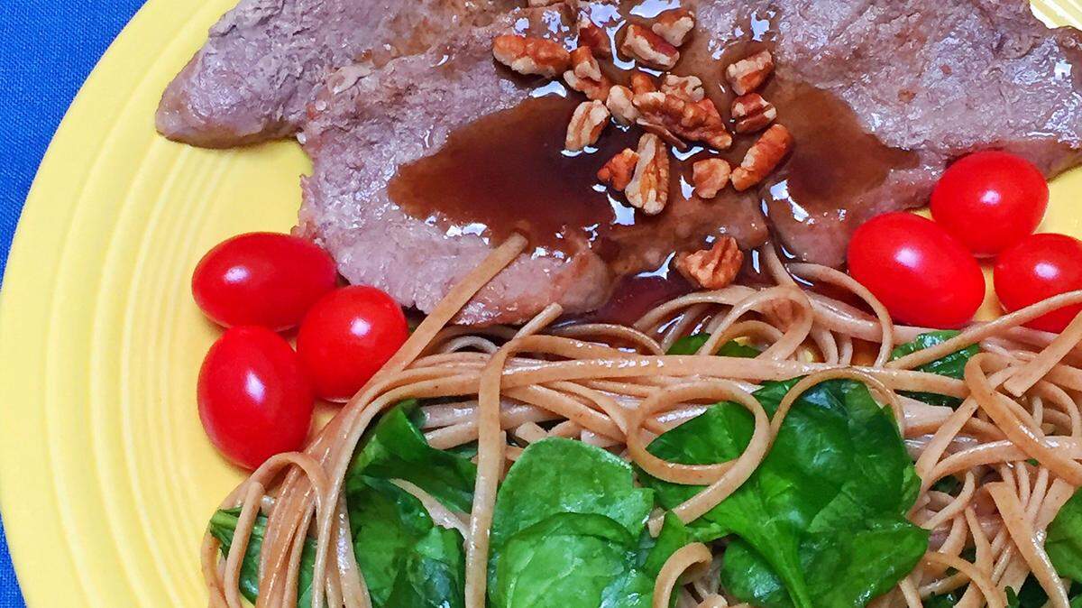 Cider glazed veal scallopini with spinach linguine. (Carl Juste/Miami Herald/TNS)