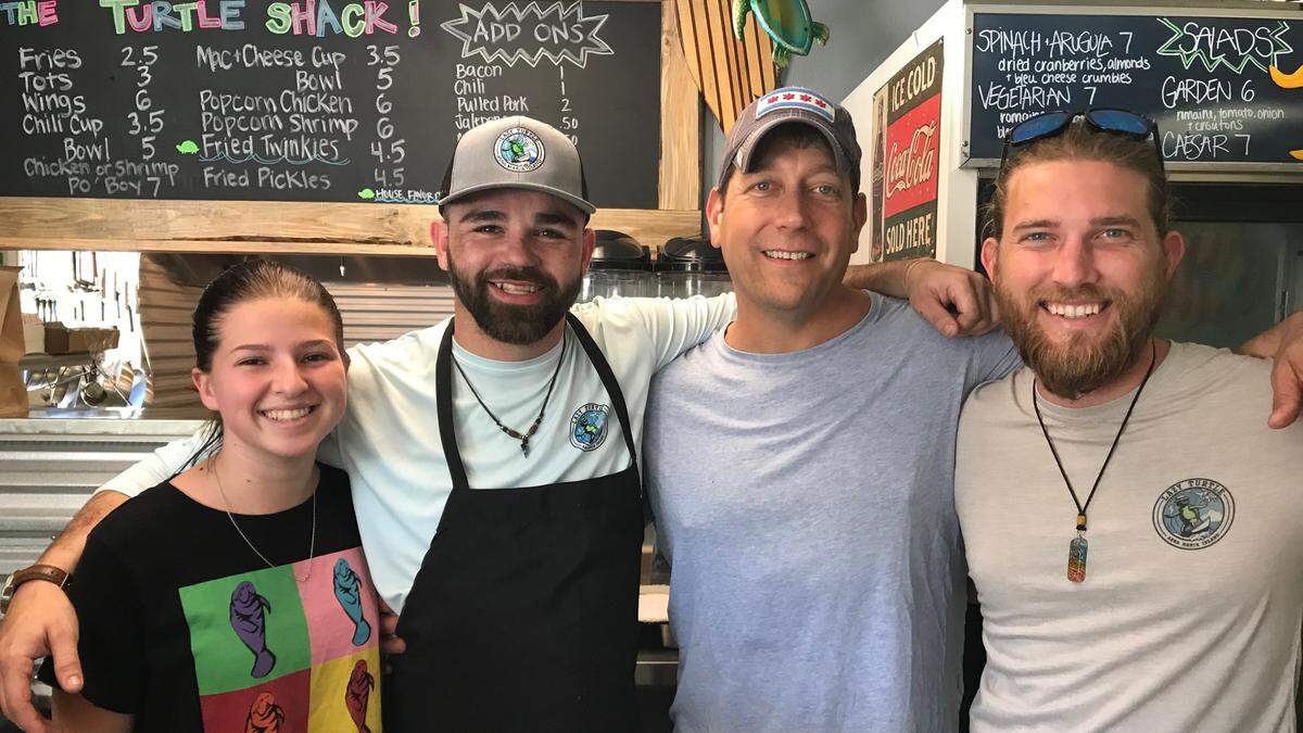 Turtle Shack recently opened at 314 Pine Ave., Anna Maria, offering beach eats with a Chicago attitude. The staff includes, from left, Finn Lebore, Robert Martinez, Joe Sabath, and Chase Woollen.