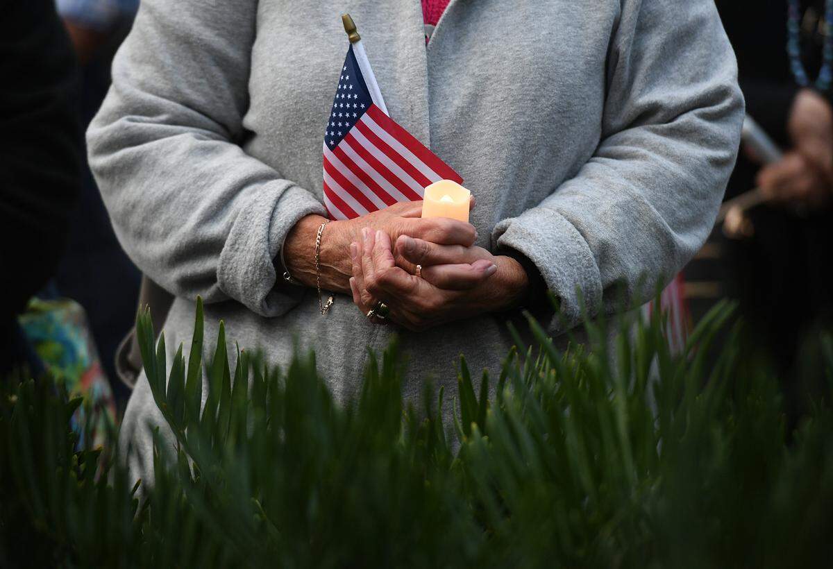 01/06/22—People gathered at Manatee County’s Historic courthouse for a Vigil for Democracy hosted by Indivisible Manatee on the anniversary of the U.S. Capitol riot.