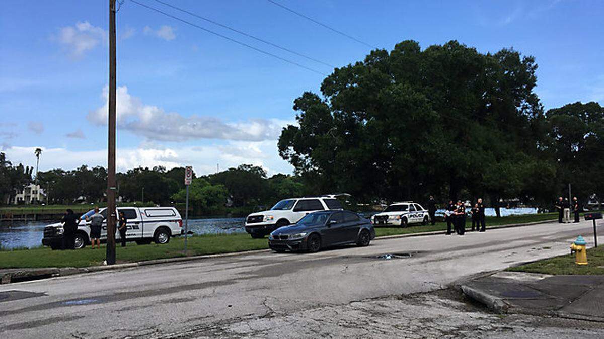 Dive crews and police officers responded at about 4:30 p.m. Thursday to the area near Columbus Drive and the Hillsborough River.