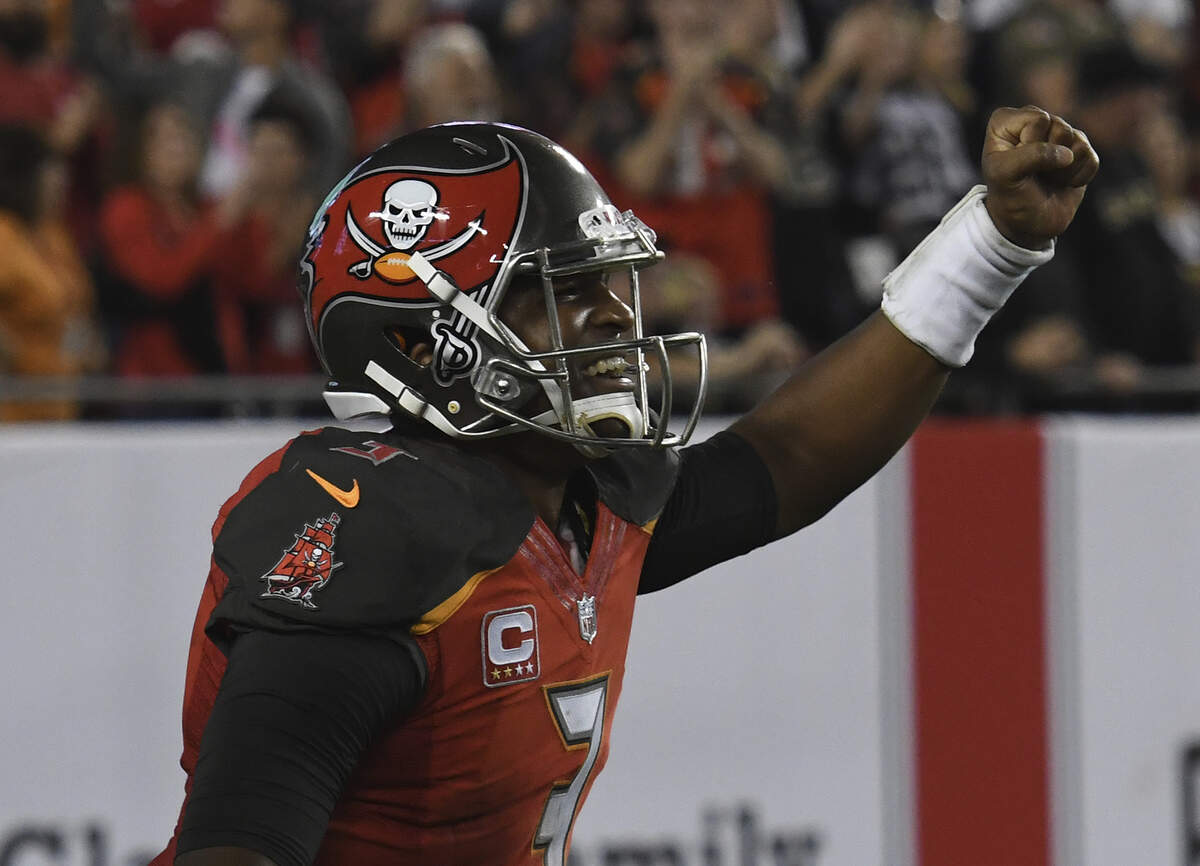 Tampa Bay Buccaneers quarterback Jameis Winston (3) celebrates after throwing a touchdown pass against the New Orleans Saints during the second half of an NFL football game Sunday, Dec. 31, 2017, in Tampa, Fla.