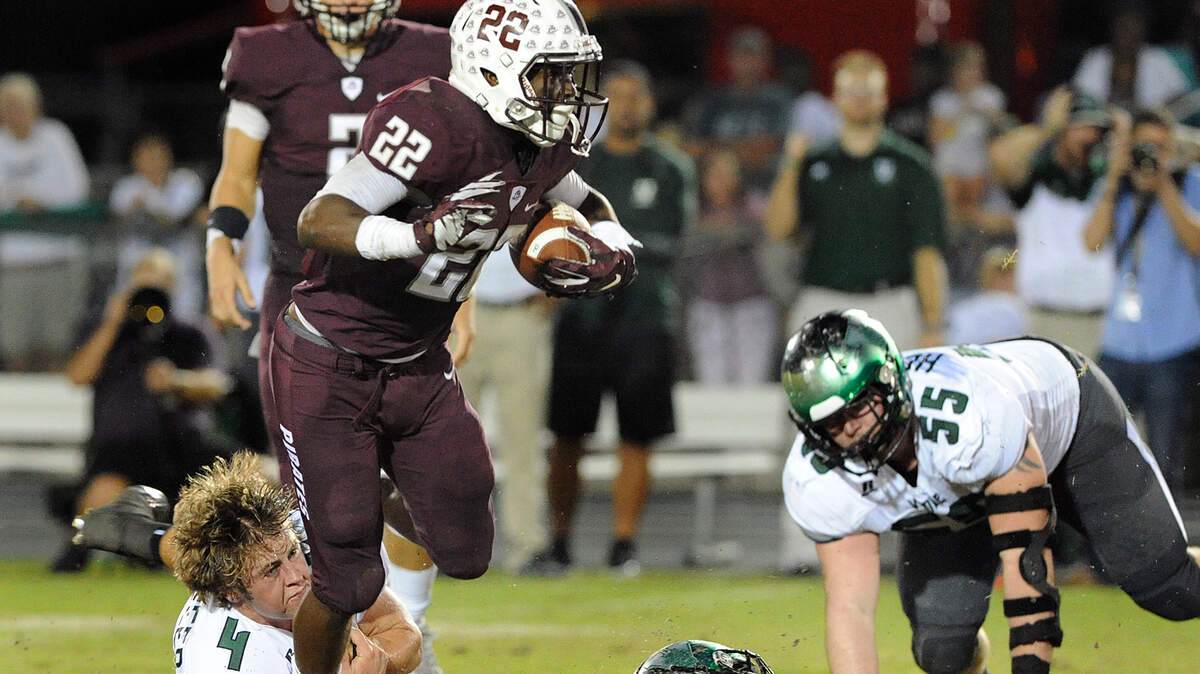 Venice's Christian Vanderveer's helmet flies off as he tries to stop Braden River's Dexter Hodo Friday night.TIFFANY TOMPKINS-CONDIE/Bradenton Herald