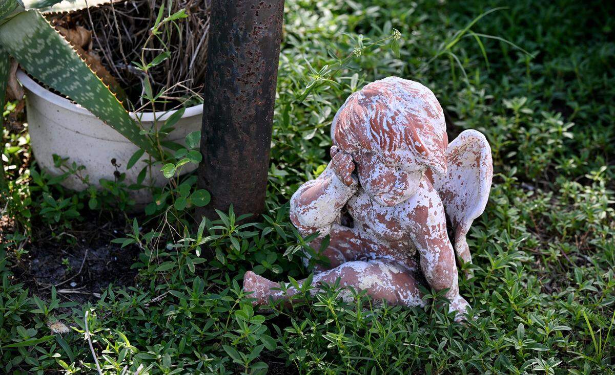 A small angel sits at the base of the mailbox of the home where Nicholas Bassler Jr. and Sierra Campany of Bradenton live. The couple were arrested on sexual battery and child porn charges, the Manatee County Sheriff’s Office said.