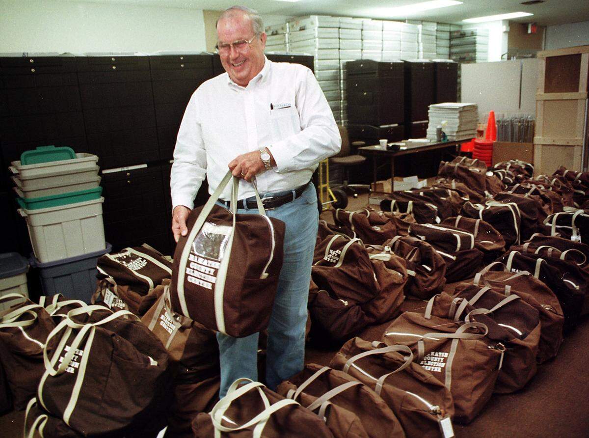 Bob Sweat, Supervisor of Elections, stands amid rows of ballots from Manatee County which have been “under lock-down” at the Supervisor’s office in downtown Bradenton in this 2000 file photo.