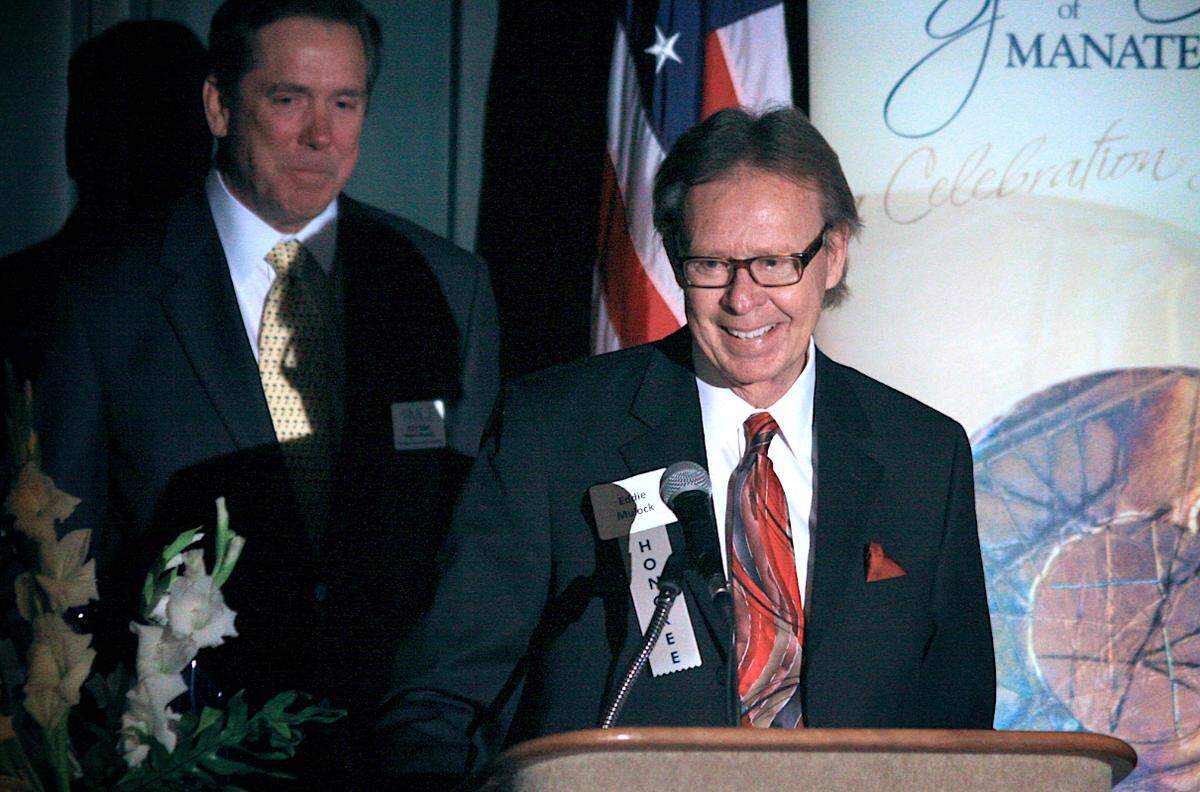 PAUL VIDELA/pvidela@bradenton.com Bradenton attorney Edwin T. Mulock speaks to guests at the Spirit of Manatee Awards ceremony after receiving the Lifetime award Wednesday.