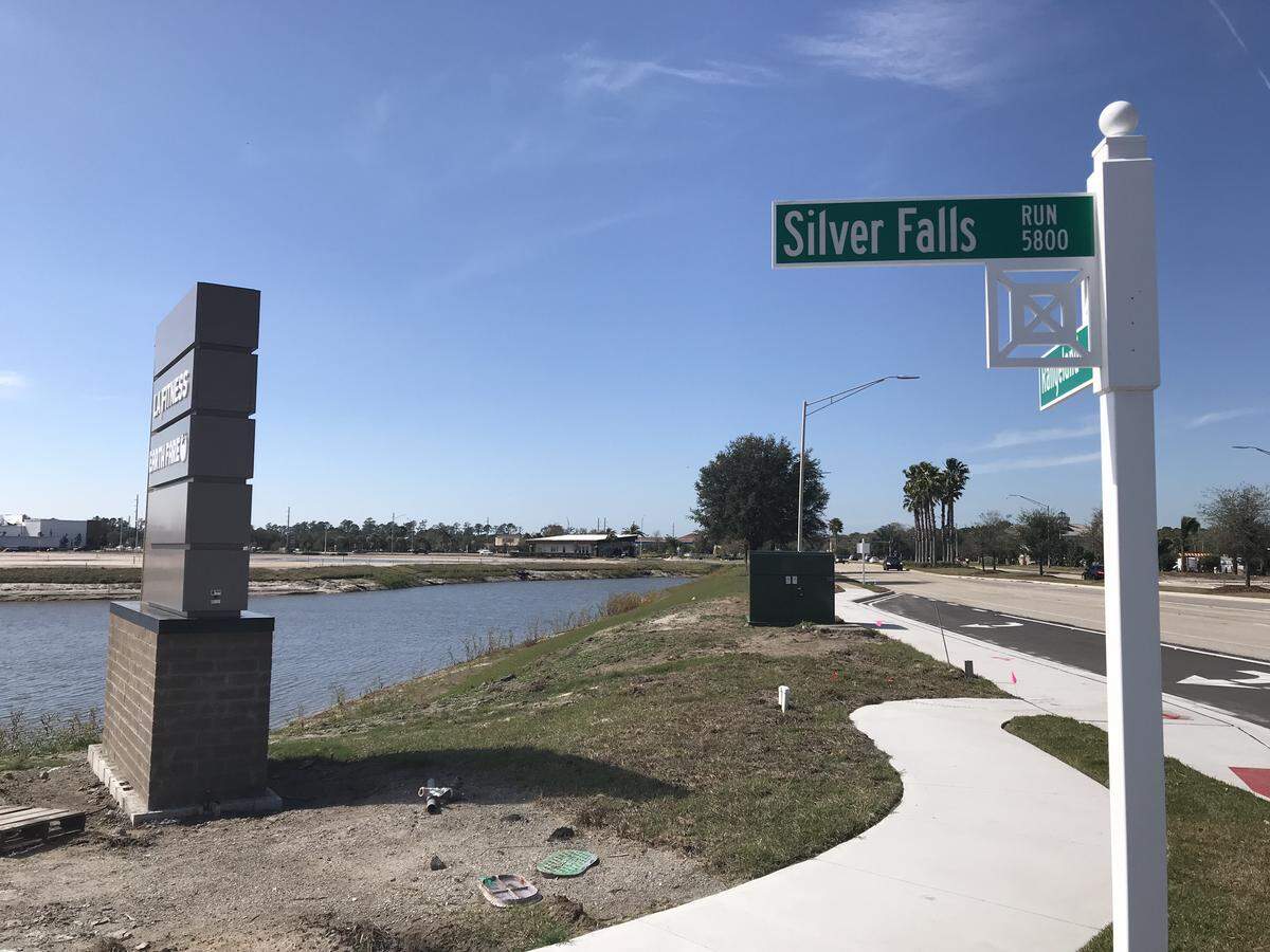 Optimal Outcomes is designing and building  a Florida Cancer Specialists facility on Silver Falls Run, shown above looking toward The Green at Lakewood Ranch, which is home to Earth Fare grocery.