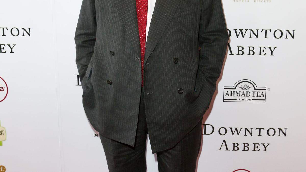 For his next project, "Belgravia," Julian Fellowes is marrying an old narrative form -- the serialized novel, in the tradition of Charles Dickens' "The Pickwick Papers" -- with the latest digital delivery system: an app. Photo by RICH FURY/Invision/AP, File