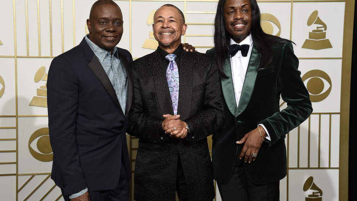 From left, Philip Bailey, Ralph Johnson and Verdine White of Earth, Wind & Fire, at the Grammy Awards in 2016. Bailey sings in the latest Greg Cote Show podcast.