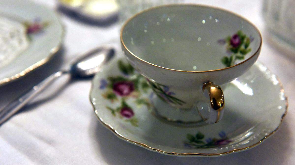 Dainty tea cups were laid out for a high tea to celebrate 25 years of a Sunday school class at il Villaggio Homes. 
 TIFFANY TOMPKINS-CONDIE/Bradenton Herald