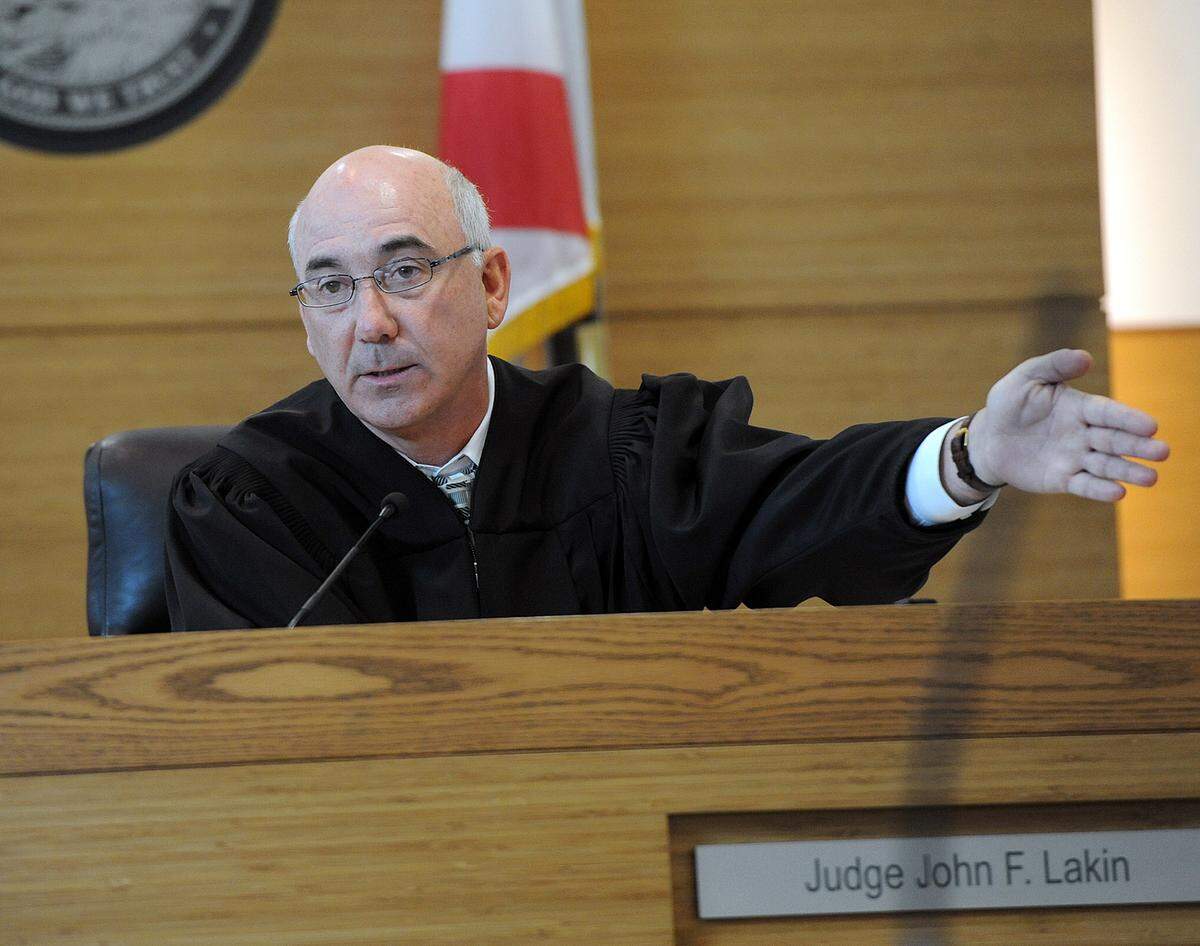 Judge John F. Lakin sentences a defendant found guilty in a past trial at the Manatee County Judicial Center.  TIFFANY TOMPKINS-CONDIE/Bradenton Herald