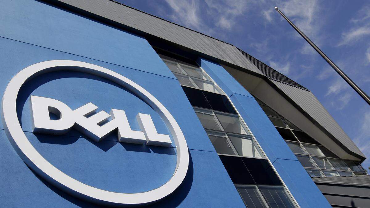 The sun is reflected in the exterior of Dell Inc.'s offices in Santa Clara, Calif. Dell Inc. agreed to buy EMC Corp. for about $67 billion in the largest technology acquisition ever as Michael Dell looks to leverage EMC's dominance in storage devices amid intensifying competition. AP FILE PHOTO