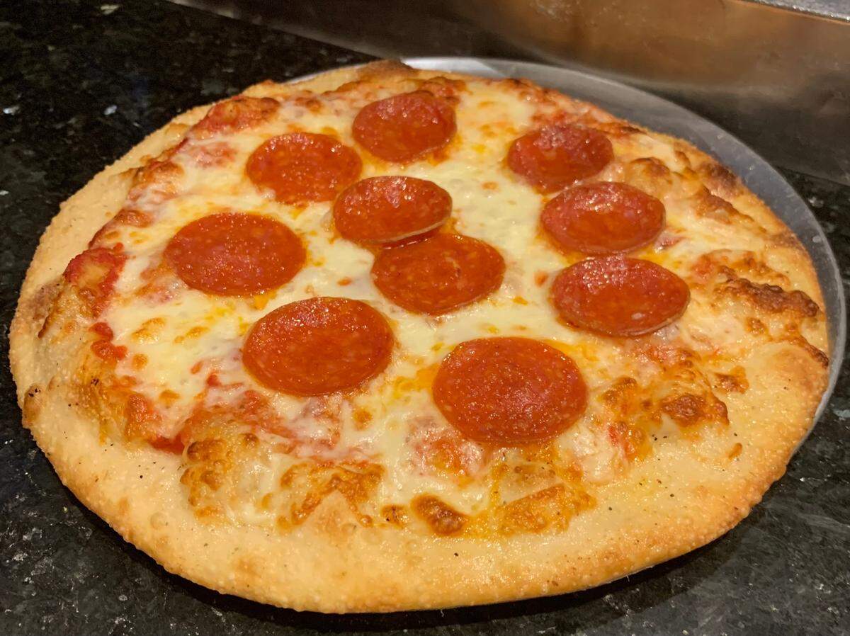 Partners Amanda Ventura and Christopher Doe recently opened Scuderia Italian Cuisine at 4805 Cortez Road W., next door to the Regal Oakmont cinema. Shown above is one of their small pizzas.