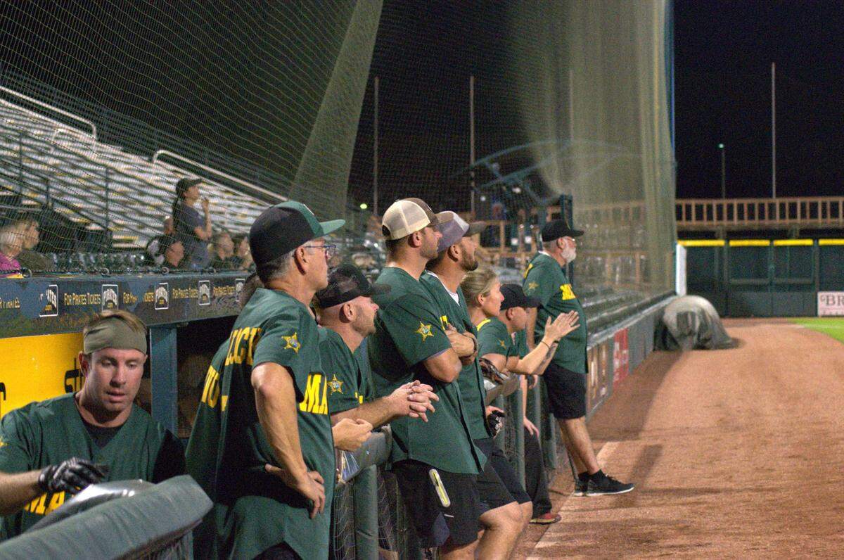 The Bradenton Police Department faced off against the Manatee County Sheriff’s Office in “Battle of the Badges,” a baseball match for charity at LECOM Park on Tuesday.