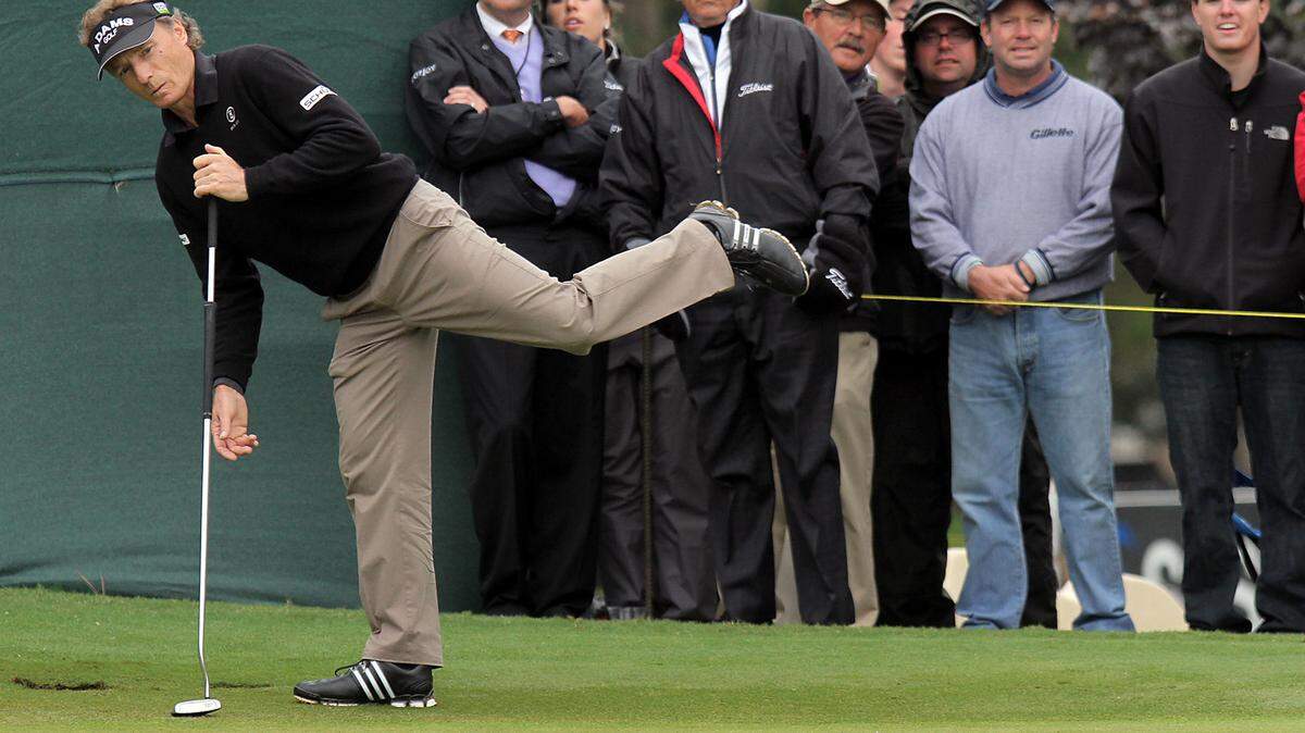 FILE - In this Oct. 7, 2012, file photo, Bernhard Langer reacts to missing an eagle putt on the 17th green during the Champions Tour golf tournament at Prestonwood Country Club in Cary, N.C. Langer, who has been using a long putter for 15 years, was perplexed when the U.S. Golf Association and the Royal & Ancient Golf Club announced a new rule that would ban players from anchoring the club to the body. (AP Photo/Ted Richardson, File)