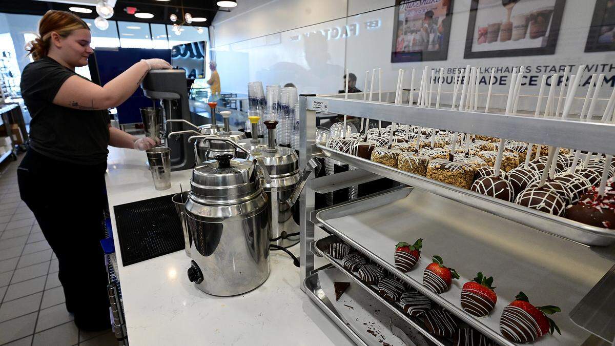 Manager Bailey Barry works on a sweet treat of milkshakes for a family at The Milkshake Factory at 7230 Manatee Ave. W. on Jan. 21, 2026.