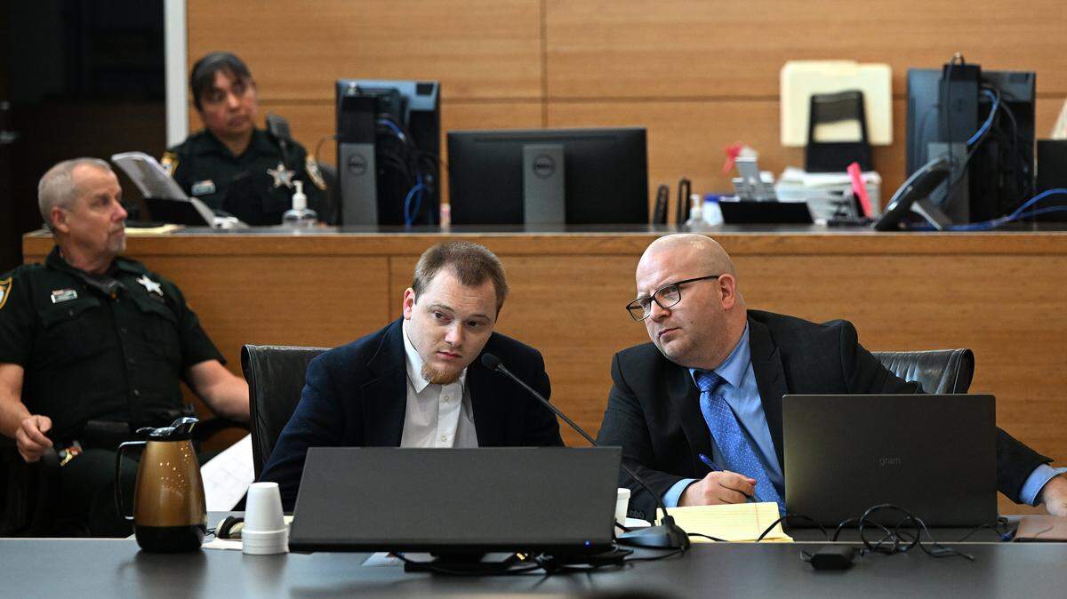 Nicholas Bassler, 27, appears in a Manatee County courtroom with attorney William Wynne ahead of his trial that includes charges of capital sexual battery, lewd or lascivious conduct and possession of child sexual abuse material, according to court records.