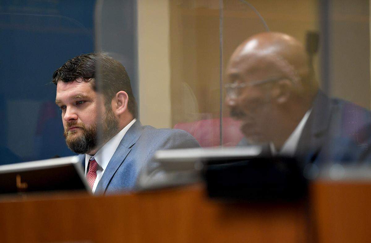 03/23/21--James Satcher listens to Reggie Bellamy during a meeting to discuss hiring an interim county administrator.