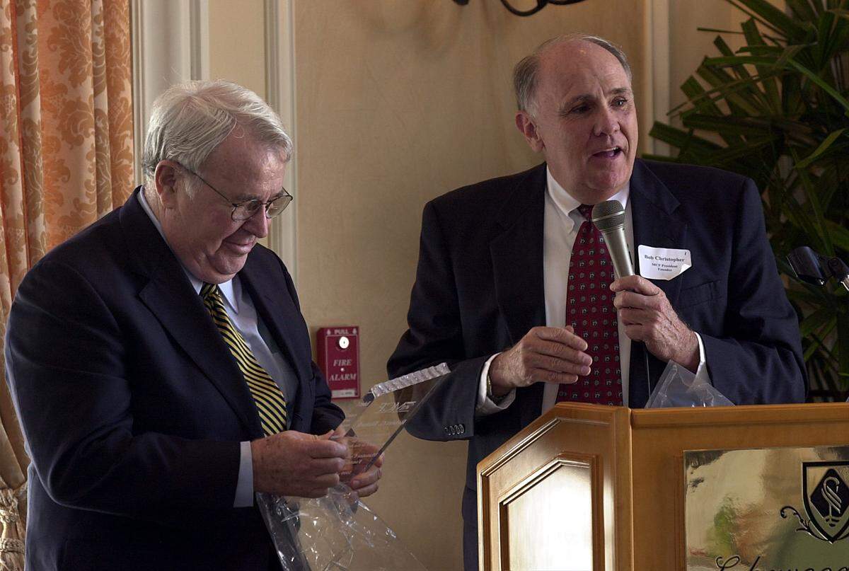 In this Bradenton Herald archive photo from 2002, Robert Blalock, immediate past president of the Manatee Community Foundation, is presented an award from Bob Christopher, who was then president.