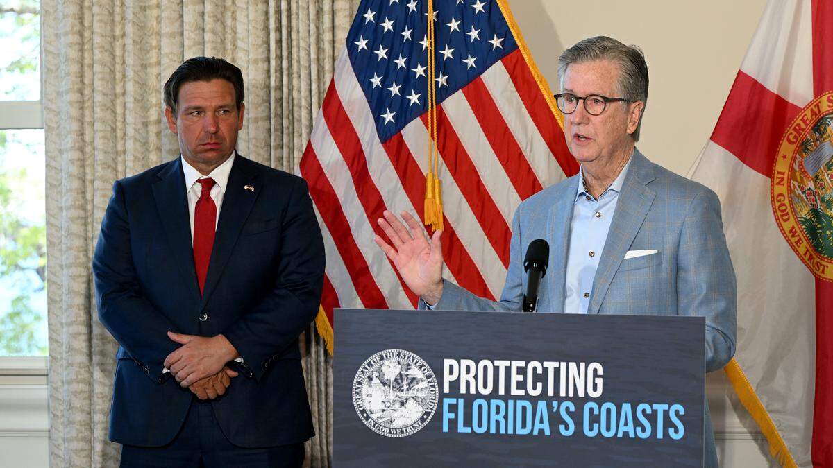 State Sen. Jim Boyd, R-Bradenton, speaks from the podium during a Thursday, March 19, 2026 press conference at Pier 22 in Bradenton as Florida Gov. Ron DeSantis announced he would sign a bill aiming to block the development of a Terra Ceia cruise port terminal in Manatee County.