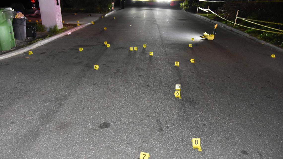 Yellow evidence markers can be seen at the scene of shooting where three people were shot on Monday, Jan. 23, 2023.