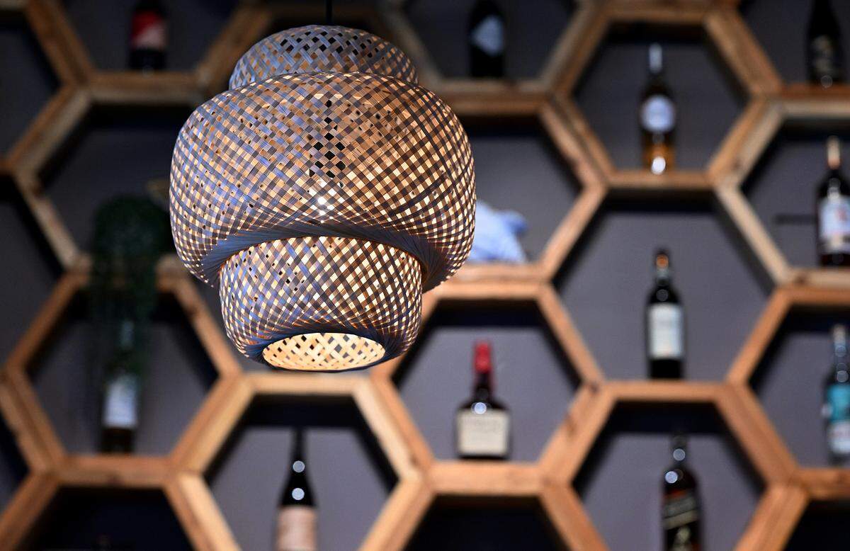 Soft lighting over the bar area at Sofra Kitchen Bar & Bistro in downtown Bradenton.