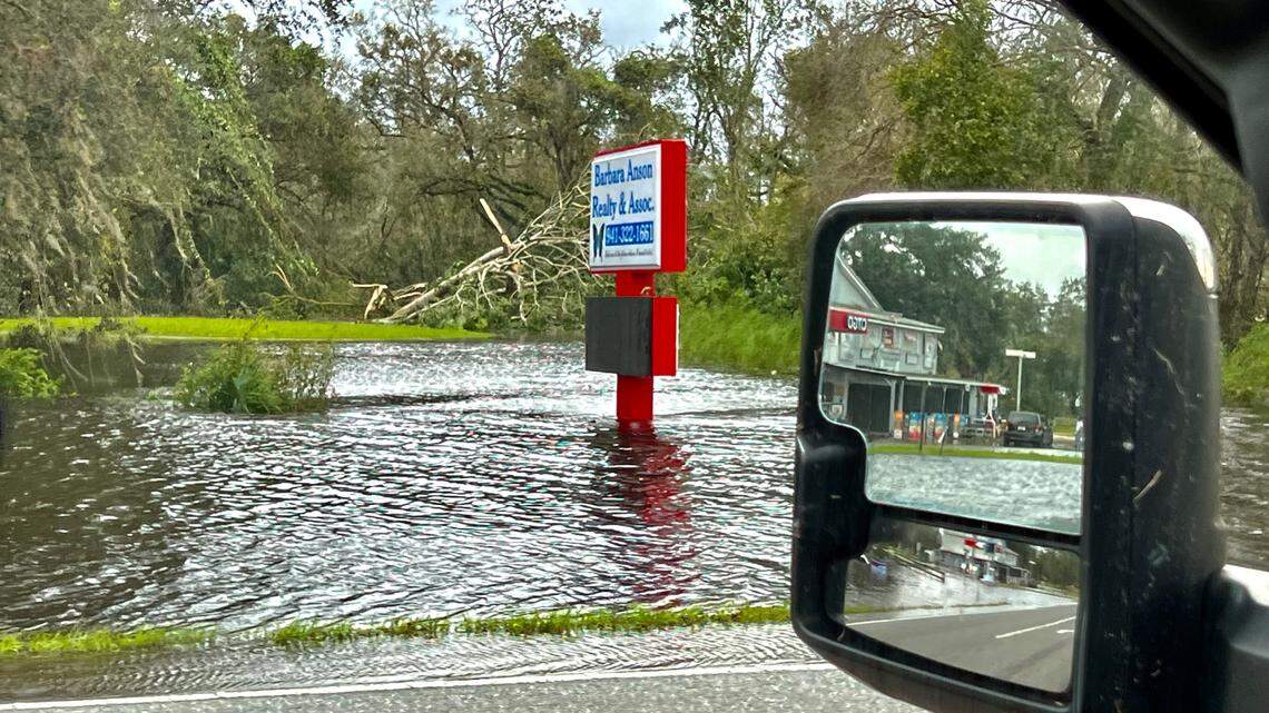 Flood waters surrounded a real estate company’s sign in Myakka City on Thursday morning.