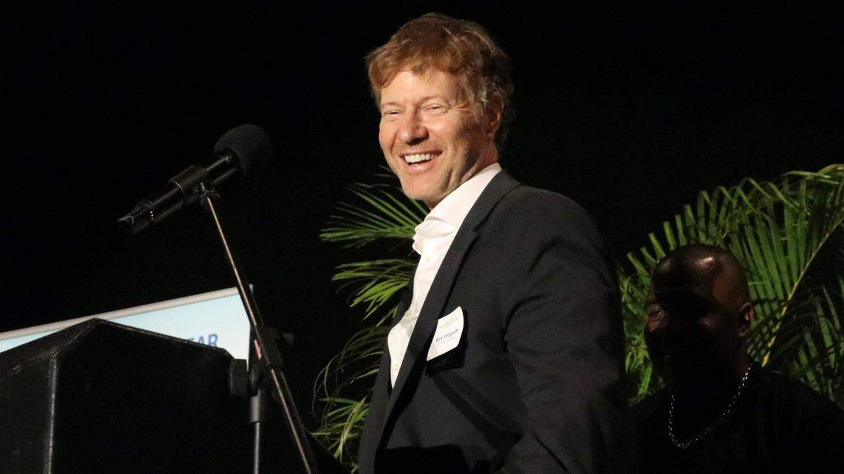Mark Vengroff led his One Stop Housing team onstage to accept the Category V small business of the year award from the Manatee Chamber of Commerce 6/29/2023.