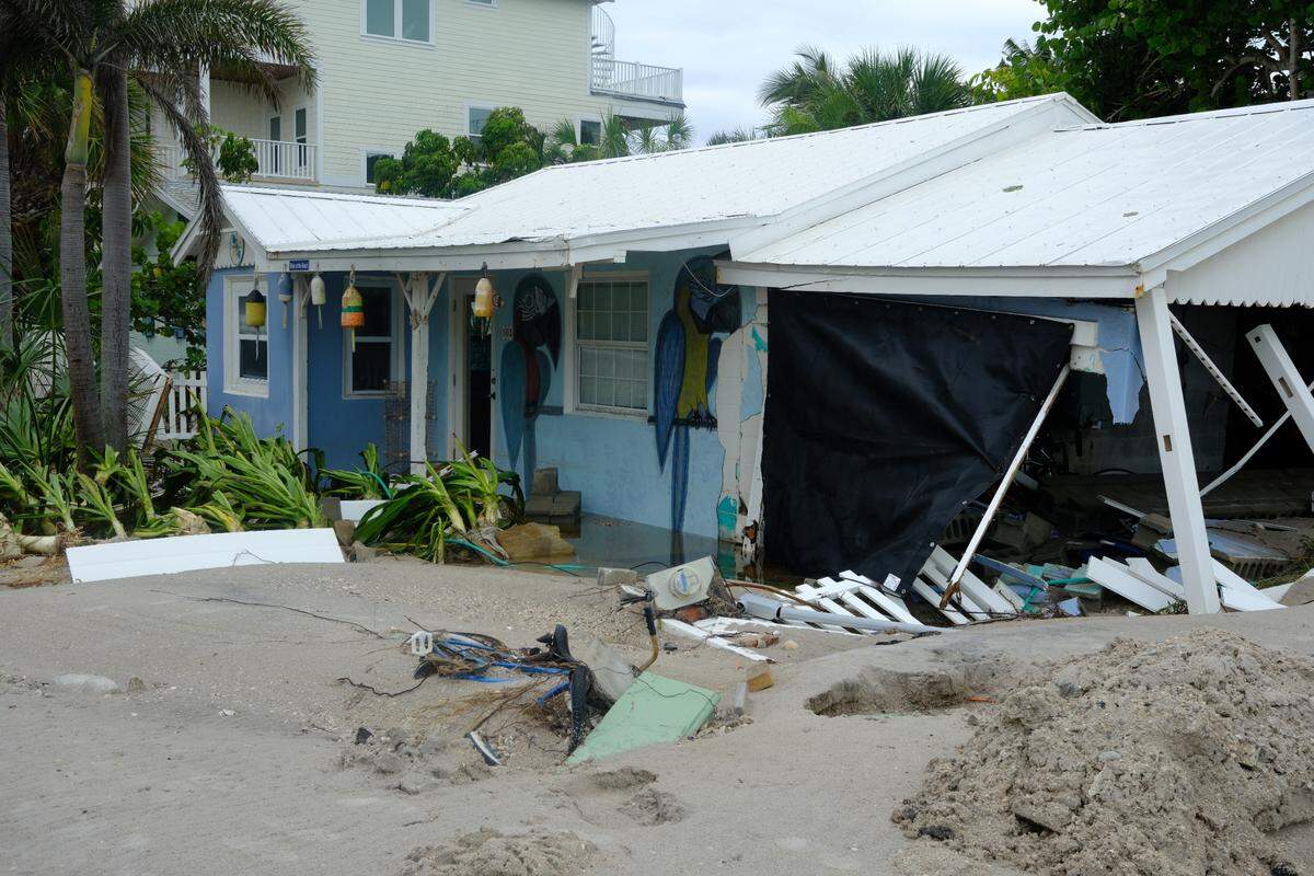 Hurricane Helene’s storm surge flooding ruined homes on Anna Maria Island as the powerful Category 4 storm passed Manatee County in the Gulf of Mexico.