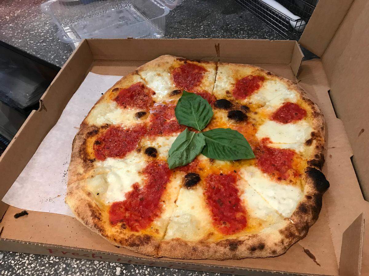 Brancato’s Brick Oven Pizza, 5227 Manatee Ave. W., Bradenton, produces heat of 700 to 1,000 degrees and can cook a pizza like this in just a few minutes.