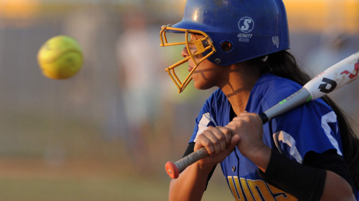 Bayshore High's Liz Alvarez keeps her eye on a pitch as the Bruins host the DeSoto High Bulldogs in a Class 5A-Region 3 softball semifinal on Tuesday at Bayshore High. 
 GRANT JEFFERIES/Bradenton Herald