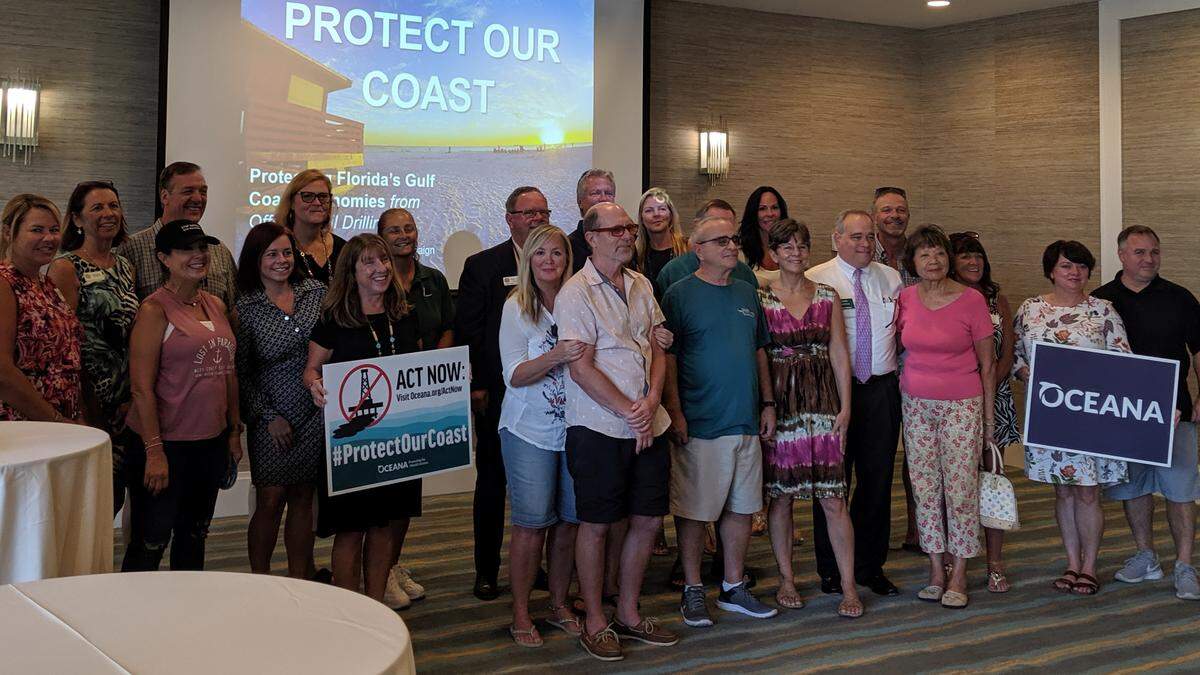 Local business people from Anna Maria Island, Cortez and Manatee County posed for a photo after a presentation about the impacts of offshore drilling at Waterline Marina Resort in Holmes Beach on Tuesday. 