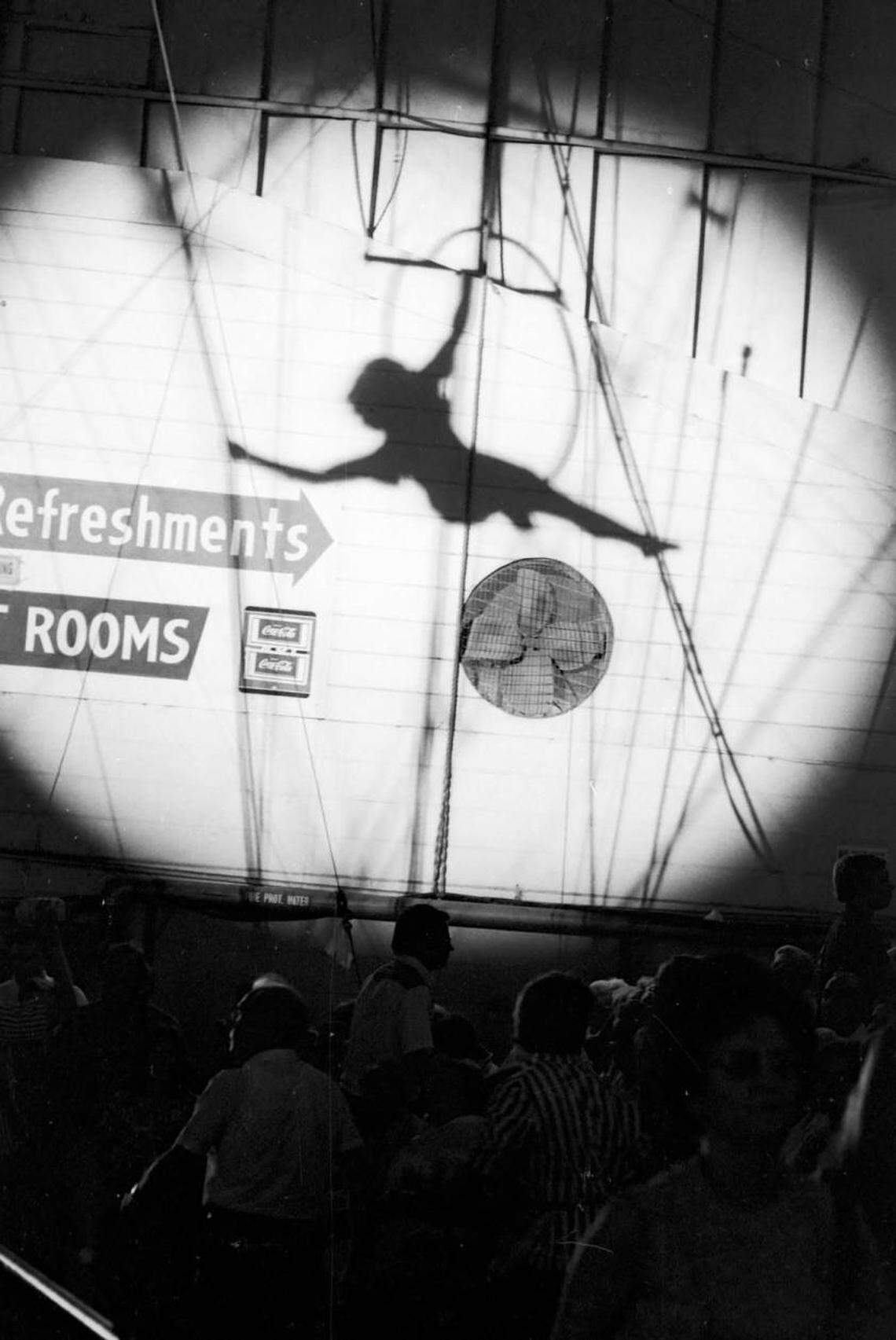 The silhouette effect of a circus aerialist in 1976.