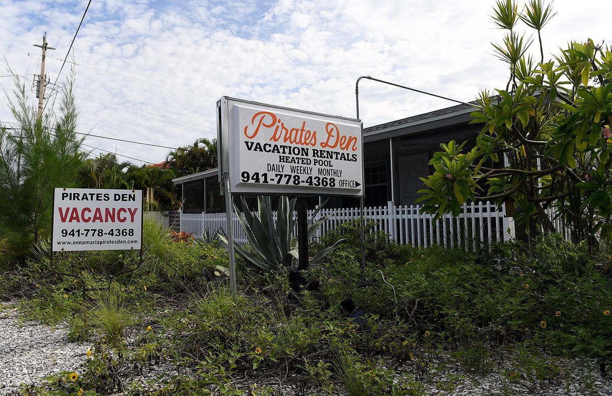 Red tide has hit area businesses hard, keeping crowds away from the island. But owners have hopes that Labor Day weekend business will be strong.