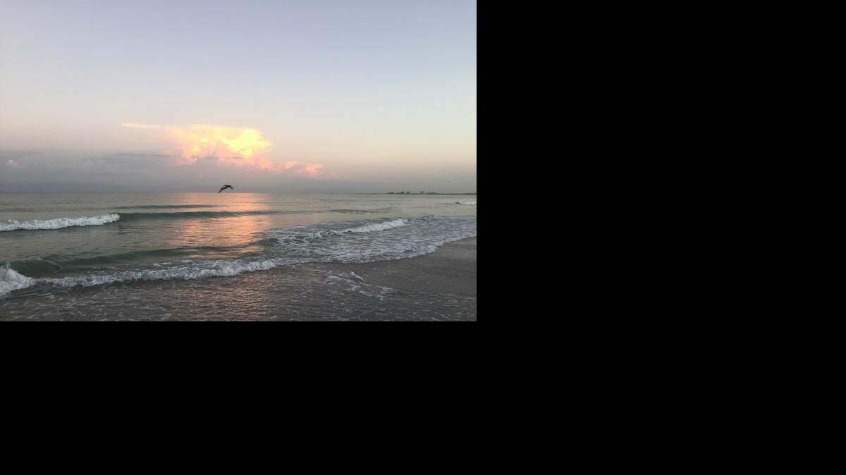 Sunrise over St. Pete Beach featured a few clouds Wednesday. A record high temperature of 97 degrees was set Wednesday at the Sarasota-Bradenton International Airport. 