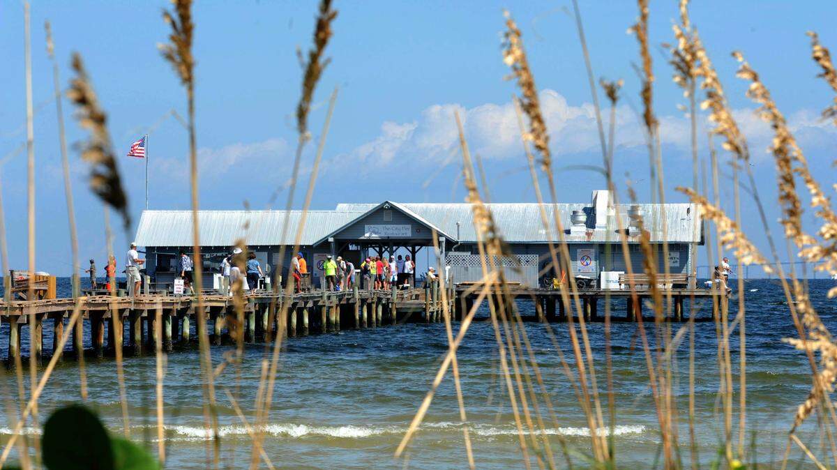 People on the Anna Maria City Pier as they enjoy the day in this 2014 file photograph. 
 File Photo-GRANT JEFFERIES/Brdenton Herald