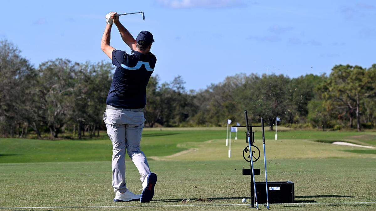 A golfer at the driving range of the newly-opened Soleta Golf Club in Myakka City.