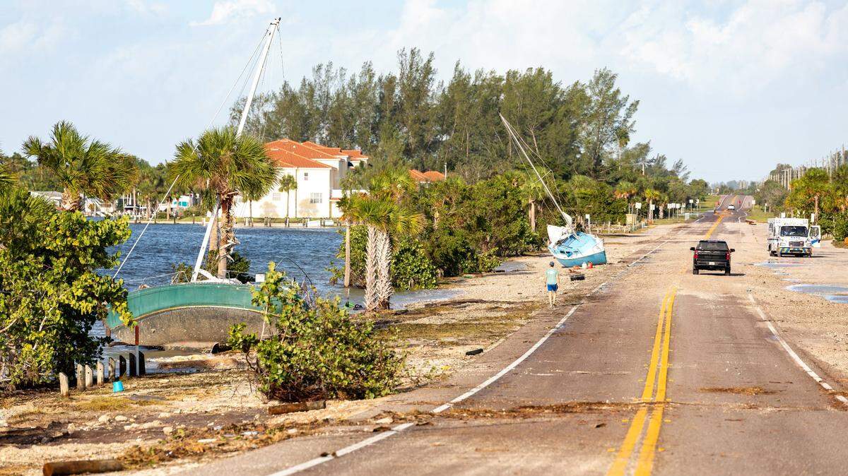 The Palma Sola Causeway that connects Bradenton and Anna Maria Island remained closed Friday, Sept. 27, 2024, after Hurricane Helene’s storm surge sent water rushing over the roadway, carrying at least two sailboats with it.