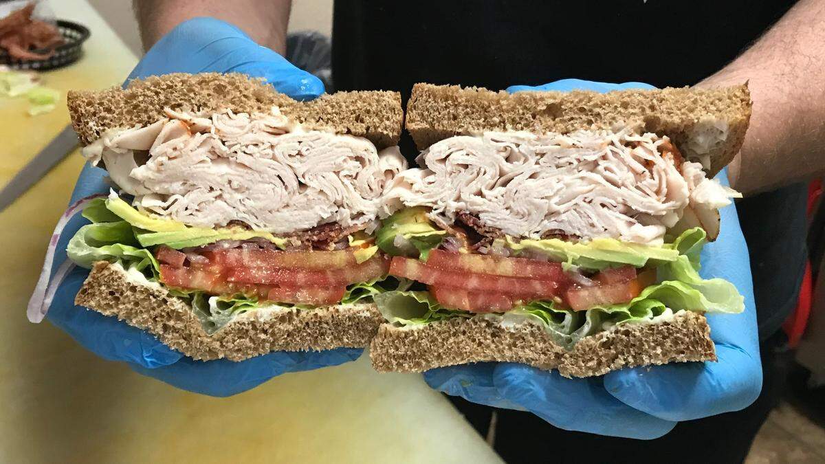 Better bring your appetite and a good grip for this turkey, bacon, and avocado sandwich at Scott’s Deli, 5350 Gulf Drive, Holmes Beach.