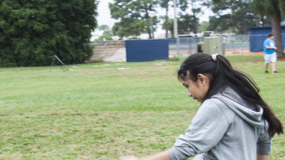 SCF Collegiate School 7th grader Sandra Salitre earned the right to the first kick of the kickball game that pitted her class against their 8th grade counterparts by donating 23 cans of food to the 7th grade food drive, part of the school's Global Citizen Initiative. PHOTO PROVIDED