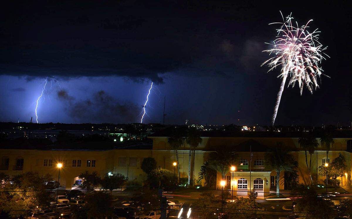 Lighting vies with fireworks exploding over the Bradenton City Centre in this file photo.