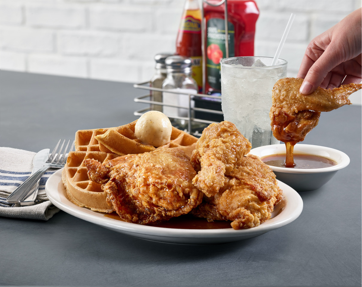 Chicken and waffles with a special sticky sauce and sweet and spicy syrup is one of the signature items that will be offered at Metro Diner locations this Mother’s Day.